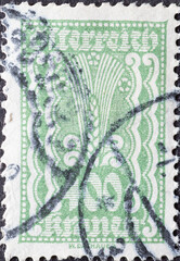 Austria - circa 1922: a postage stamp from Austria, showing a symbolism: ear of corn