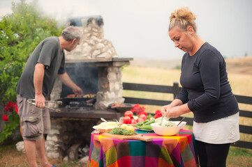 Obraz premium BBQ grilling party. Happy friends having backyard barbecue party
