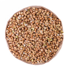 green buckwheat in a paper bag on a white background
