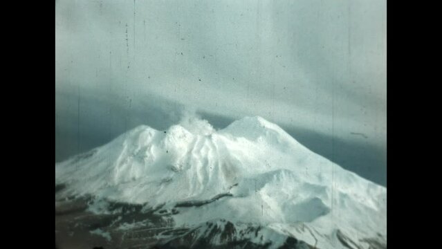 Adak Snowy Peak 1947 - Flying over a frozen Adak Island in Post World War II Alaska