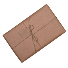 A gift wrapped in paper with a postcard for a message, isolated on a white background.