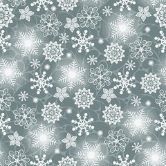 Christmas silvery seamless pattern with snowflakes on the background of floral ornament. Vector eps 10