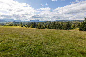 Panorama of mountains in the Ukrainian Carpathians on a summer day.