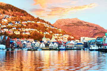 Historic Bryggen waterfront at sunset in Bergen, Norway