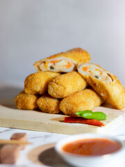 Homemade Indonesian Risoles - a mixture of chicken, carrots and potatoes and coated with breadcrumbs