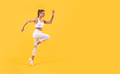Fototapeta na wymiar fitness woman runner running on yellow background with copy space