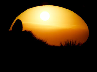 sunrise within the ibex horns