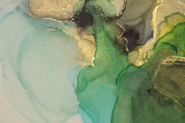 Art Abstract watercolor and Alcohol ink flow wave blot painting. Gold  and green color canvas marble texture background.