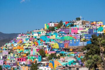 Colorful living district in Pachuca, Hidalgo state, Mexico. Grand Mural - Colorful buildings in...