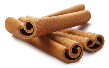 Delicious cinnamon sticks, isolated on white background