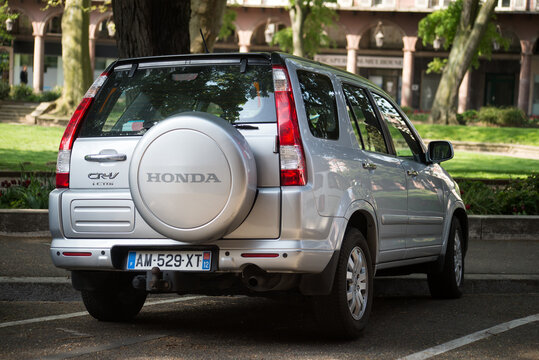 Mulhouse - France - 22 April 2022 - Rear  view of grey Honda CRV SUV car parked in the street
