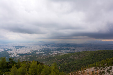 Fototapeta na wymiar Athens cloudy cityscape panorama from mount Hymettus