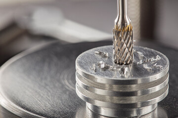 Milling сutter and drill bit make sink in hole in steel billet. Locksmith work.