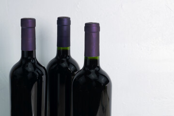 Three bottles of red wine
