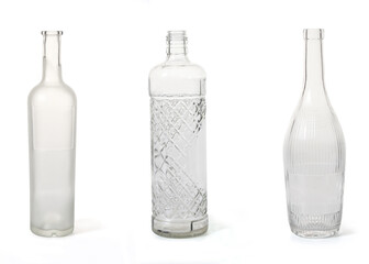 group of opaque and textured bottles on white background