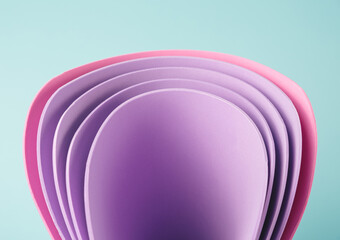 Perwinkle and pink curved sheets on a minty background. Abstract business backdrop