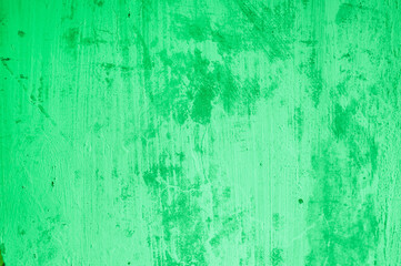 Obraz premium Background, texture of a painted concrete stained dirty wall in green. Photo after renovation, concept.