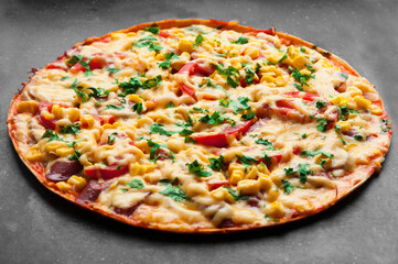 delicious pizza close up. carbonara with fresh vegetables. large pie with vegetable filling. fast food concept