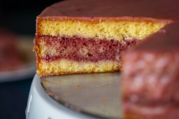 Delicious home made punch Cake - Sweet Dessert on White cake stand on Table, mothers day, Culinary sweet and juicy dessert serving