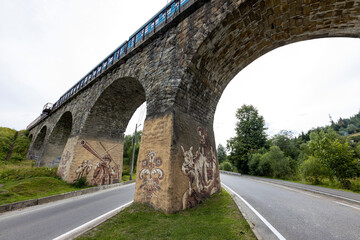 Fototapeta premium Old railway arch bridge. Panorama.
