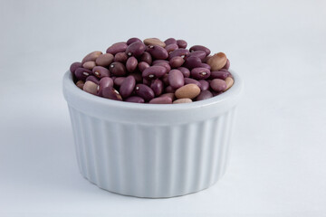 Brazilian kidney beans in a ceramic ramekin pot. Fresh, raw and healthy kidney beans