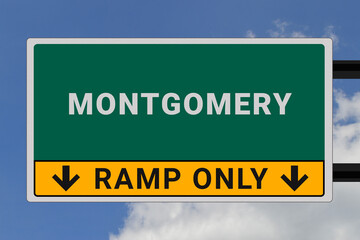 Montgomery logo. Montgomery lettering on a road sign. Signpost at entrance to Montgomery, USA. Green pointer in American style. Road sign in the United States of America. Sky in background