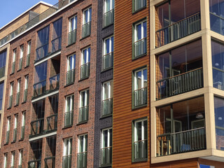 Close up of new modern building brick facade with red, brown blocks in Noblessner district. Tallinn, Estonia, Europe. April 2022