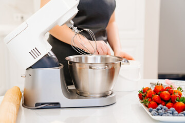 modern immersion mixer in the kitchen for baking and desserts. 