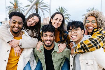 Young group of multiracial friends - Portrait of smiling united millennial people looking at camera