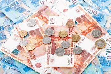 Russian rubles money. Different denomination of bills. Finance concept. Metal russian coin Money background and texture.