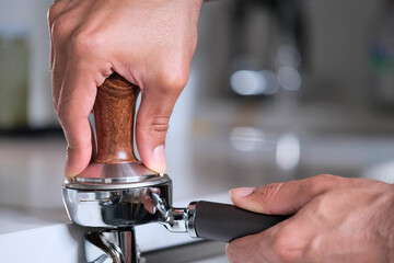 person holding a coffee press