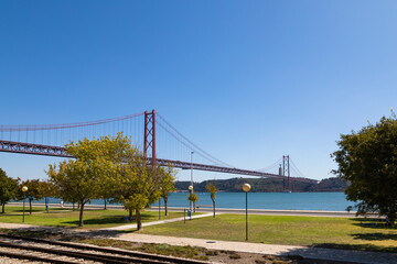 Fototapeta na wymiar The 25 de Abril Bridge over the Tagus river, Lisbon, Portugal