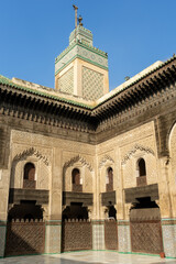Fototapeta na wymiar The minaret of Madrasa Bou Inania in the old medina of Fez 