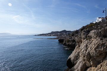 Fototapeta premium cliffs in the mediterranean sea with clear water, blue sky and calm sea
