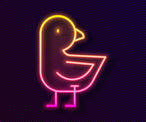 Glowing neon line Little chick icon isolated on black background. Vector