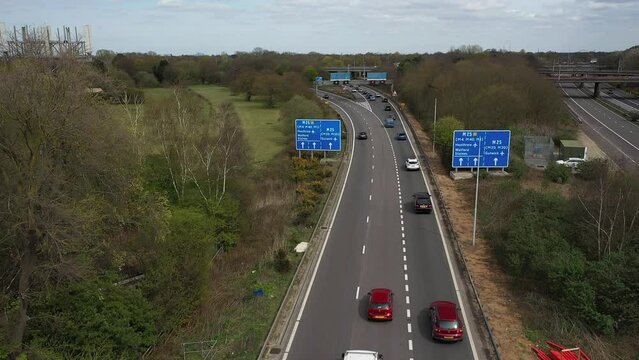 Aerial view for busy motorway , birdseye view busy cars and roads,traffic , junction 11 , m25