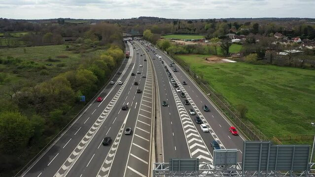 Aerial view for busy motorway , birdseye view busy cars and roads,traffic , junction 11 , m25
