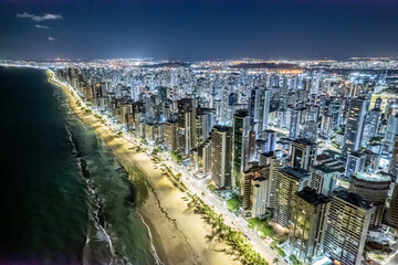 Aerial view of "Boa Viagem" beach in Recife, capital of Pernambuco, Brazil at night.