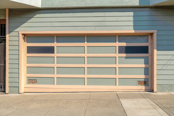 Attached garage exterior with greenish gray tones at San Francisco, California