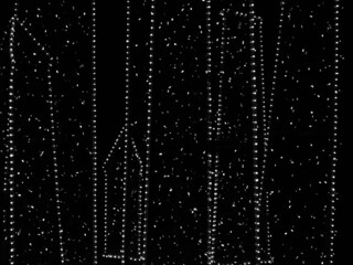 abstract black background with bokeh and dots. Defocused photography. Dotted lines, dots, circles...