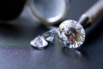 Brilliant diamond on black background