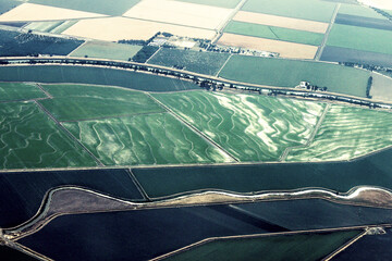 Arial view of flooded terraced fields and irrigation ditches near Sacramento California USA