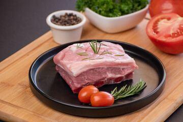 Raw pork with pepper and tomatoes