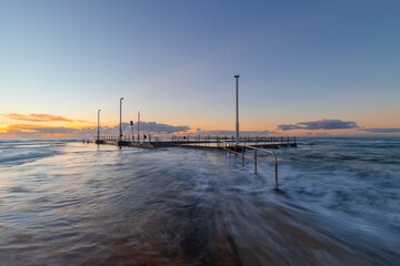 High tide water flow around Mona Vale rock pool, Sydney, Australia.