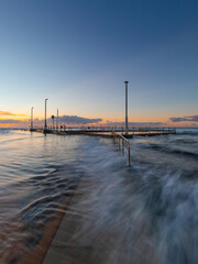 High tide water flow around Mona Vale rock pool, Sydney, Australia.