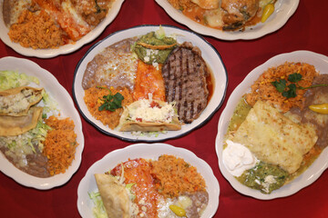 Fototapeta na wymiar Closeup spread of food at Mexican restaurant