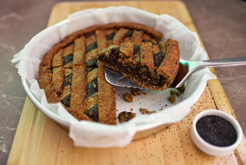 Homemade freshly baked walnuts cake with berries.