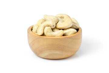 Cashew nuts in wooden bowl isolated on white background.