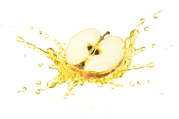 Fresh red apple with apple cider vinegar or juice splashing isolated on white background.