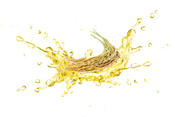 Rice bran oil splash isolated on white background.